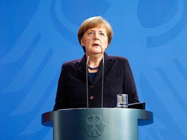 German Chancellor Angela Merkel reacts as she makes a statement in Berlin. (Reuters Photo)