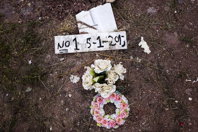 Flowers are placed on the grave of an unidentified migrant, who drowned at sea during an attempt to cross a part of the Aegean Sea from the Turkish coast, at the Saint Panteleimon cemetery of Mytilene. (REUTERS) Flowers are placed on the grave of an unidentified migrant, who drowned at sea during an attempt to cross a part of the Aegean Sea from the Turkish coast, at the Saint Panteleimon cemetery of Mytilene. (REUTERS)