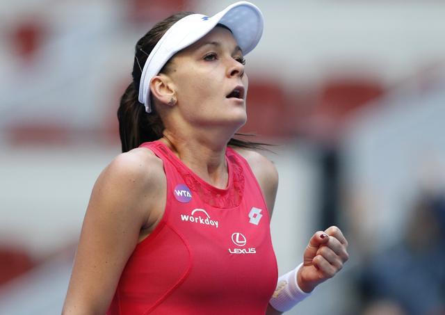 Agnieszka Radwanska of Poland celebrates after defeating Angelique Kerber of Germany in the quarterfinal of the China Open at the National Tennis Stadium in Beijing, on October 9, 2015. (AP Photo) Agnieszka Radwanska of Poland celebrates after defeating Angelique Kerber of Germany in the quarterfinal of the China Open at the National Tennis Stadium in Beijing, on October 9, 2015. (AP Photo)