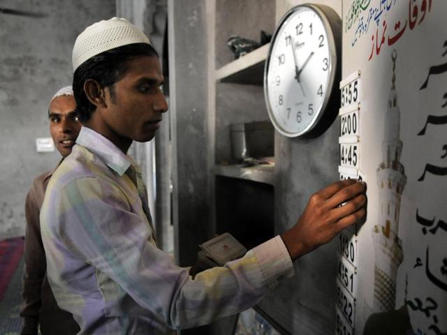 Muslim residents of Bisada village at a mosque. Prime Minister Narendra Modi on Thursday urged unity among Hindus and Mulsims in the wake of the Dadri incident and growing political pressure. (Sunil Ghosh / HT Photo)