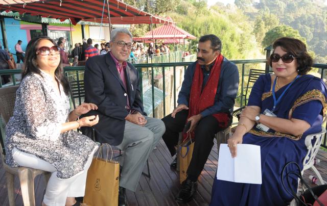 Participants of the Khuswant Singh Lit Fest sharing a light moment in Kasauli. (Keshav Singh/HT)
