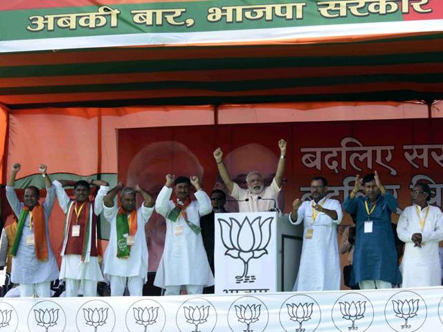 Narendra Modi addresses supporters during an election rally in the Begusrai district of Bihar on October 8, 2015.(AFP) Narendra Modi addresses supporters during an election rally in the Begusrai district of Bihar on October 8, 2015.(AFP)