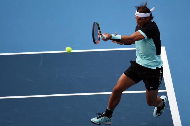 Rafael Nadal’s forehand came good when he needed it the most, in the third set, helping him wrap up the win. (AFP Photo) Rafael Nadal’s forehand came good when he needed it the most, in the third set, helping him wrap up the win. (AFP Photo)