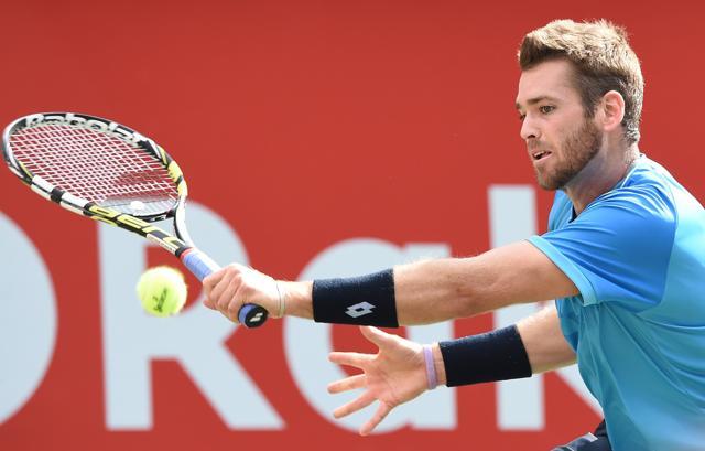 Austin Krajicek returns the ball against Stan Wawrinka during their quarter-final at the Japan Open in Tokyo, on October 9, 2015. (AFP Photo) Austin Krajicek returns the ball against Stan Wawrinka during their quarter-final at the Japan Open in Tokyo, on October 9, 2015. (AFP Photo)