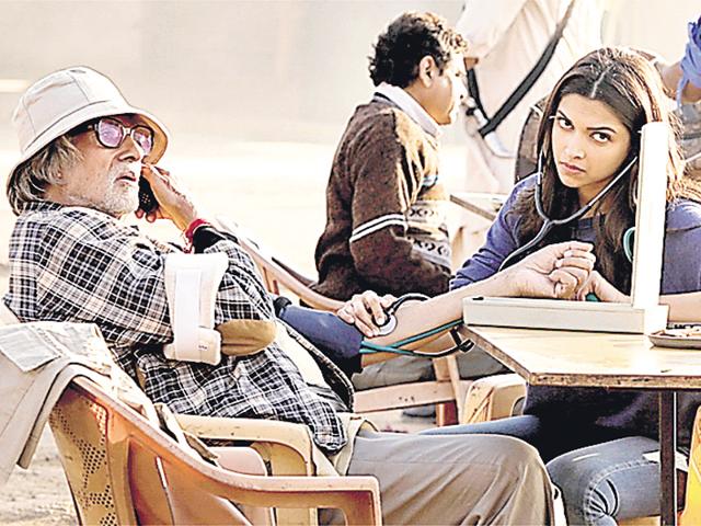 Amitabh Bachchan and Deepika Padukone in Piku. Amitabh Bachchan and Deepika Padukone in Piku.
