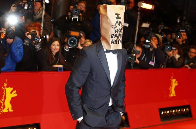 Shia LaBeouf at the Berlin film festival. Notice the bag on his head. (Reuters)