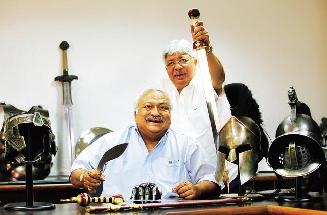 Rise of an empire: The Windlass brothers pose with replicas at their Dehradun factory. (Photo by Arvind Yadav/ Hindustan Times) (Hindustan Times)