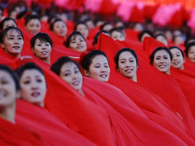Girls perform in front of a stand with North Korean leader Kim Jong Un during the parade celebrating the 70th anniversary of the founding of the ruling Workers' Party of Korea. (REUTERS)