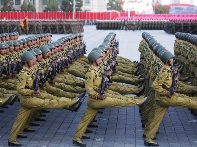 North Korean soldiers in historic uniforms march during a parade on the Kim Il Sung Square. North Korean leader Kim Jong Un declared on Saturday that his country was ready to stand up to any threat posed by the United States as he spoke at a lavish military parade. (AP)