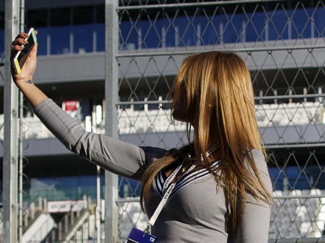 A woman taking a selfie . (Picture for representation) (AP) A woman taking a selfie . (Picture for representation) (AP)