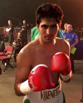 Indian boxer Vijender Singh celebrates after winning the match against England's Sonny Whiting. (PTI) Indian boxer Vijender Singh celebrates after winning the match against England's Sonny Whiting. (PTI)
