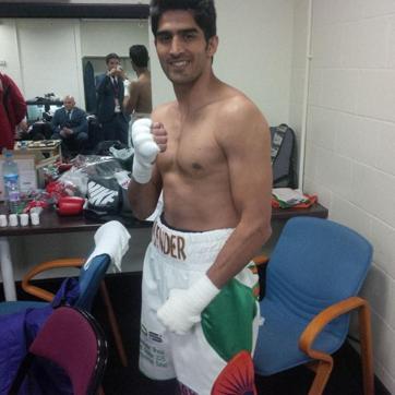 Vijender Singh before his bout against England's Sonny Whiting. (PTI) Vijender Singh before his bout against England's Sonny Whiting. (PTI)