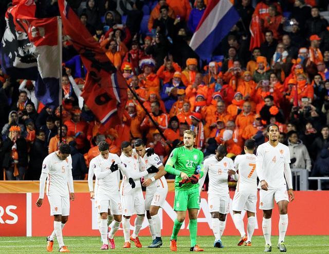 Netherland's players leave the field at the end of the Euro 2016 qualifying match against Kazakhstan in Astana, on October 10, 2015. (AFP Photo) Netherland's players leave the field at the end of the Euro 2016 qualifying match against Kazakhstan in Astana, on October 10, 2015. (AFP Photo)