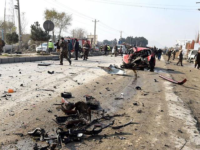 Debris and wreckage litter the scene as Afghan intelligence personnel inspect the site of a suicide attack along the Kabul-Jalalabad road in Kabul. (AFP File Photo) Debris and wreckage litter the scene as Afghan intelligence personnel inspect the site of a suicide attack along the Kabul-Jalalabad road in Kabul. (AFP File Photo)