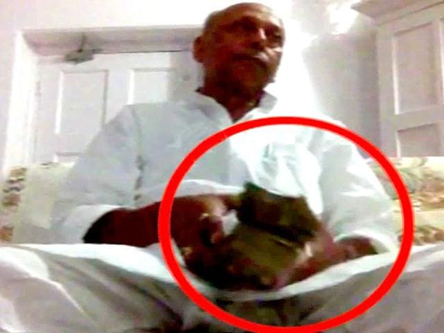 In a video that surfaced on Sunday, JD(U) leader Awadhesh Prasad Kushwaha was purportedly seen taking bribe. (YouTube videograb) In a video that surfaced on Sunday, JD(U) leader Awadhesh Prasad Kushwaha was purportedly seen taking bribe. (YouTube videograb)