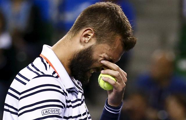 Benoit Paire grimaces in pain during the match. (Reuters Photo) Benoit Paire grimaces in pain during the match. (Reuters Photo)