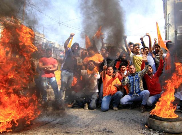 Bajrang Dal members shout slogans during a shutdown in Jammu on Saturday. (Nitin Kanotra/HT Photo) Bajrang Dal members shout slogans during a shutdown in Jammu on Saturday. (Nitin Kanotra/HT Photo)
