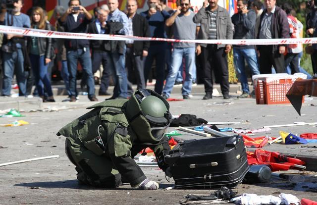 A bomb-disposal expert inspects a suitcase at the site of twin explosions near the main train station in Turkey's capital Ankara. (AFP) A bomb-disposal expert inspects a suitcase at the site of twin explosions near the main train station in Turkey's capital Ankara. (AFP)
