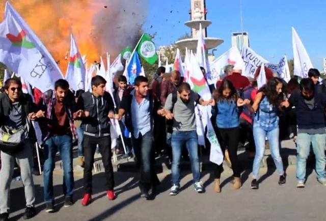 This video grab image taken from footage made available by local source "Dokuz8 Haber" shows the moment an explosion ripped through a gathering ahead of a planned peace rally in Ankara. (AFP)