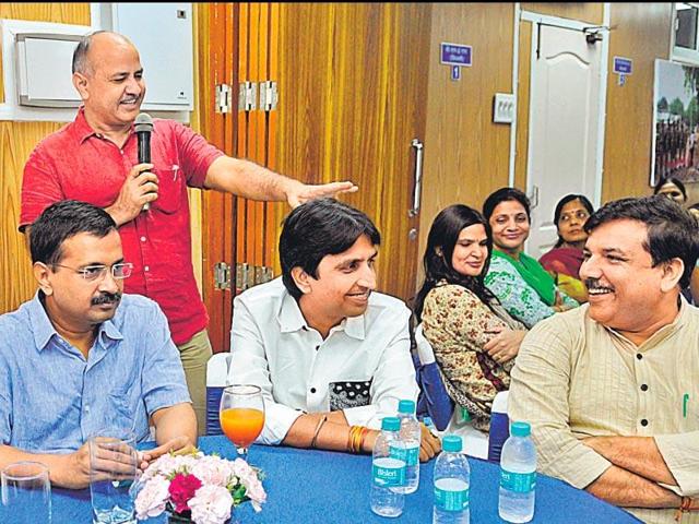 Delhi CM Arvind Kejriwal with senior AAP leaders during an interaction with party MLAs and their families at his residence on Sunday. (Sonu Mehta/HT Photo) Delhi CM Arvind Kejriwal with senior AAP leaders during an interaction with party MLAs and their families at his residence on Sunday. (Sonu Mehta/HT Photo)
