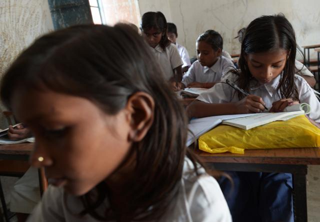 Schoolchildren attend class at Koderma District. (AFP) Schoolchildren attend class at Koderma District. (AFP)