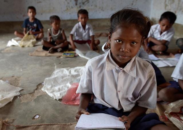 Schoolchildren attend class at Koderma District. (AFP) Schoolchildren attend class at Koderma District. (AFP)