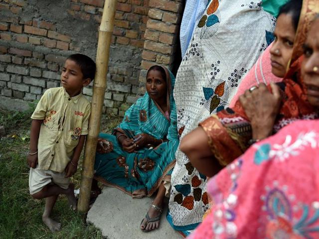 Voters queue to cast their ballots in the village of Banbira in Samastipur district. (AFP)