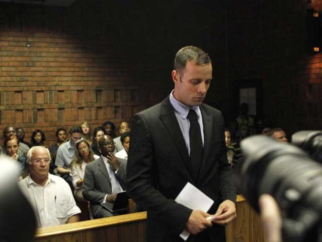 Oscar Pistorius stands in the dock during a break in court proceedings at the Pretoria Magistrates court. (Reuters File Photo) Oscar Pistorius stands in the dock during a break in court proceedings at the Pretoria Magistrates court. (Reuters File Photo)