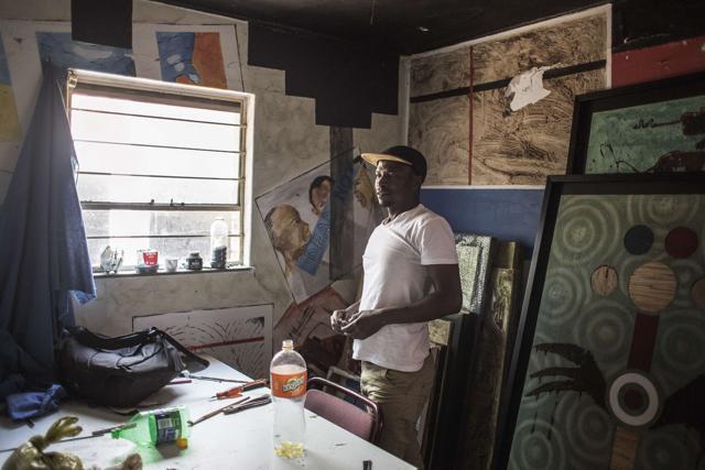 Artist Mzi Gojo stands in his studio among his artworks at the FUNDA art foundation in Soweto. Gojo, too, is a member of Ubuhle Bobuntu. (AFP/ Gianluigi Guercia) Artist Mzi Gojo stands in his studio among his artworks at the FUNDA art foundation in Soweto. Gojo, too, is a member of Ubuhle Bobuntu. (AFP/ Gianluigi Guercia)