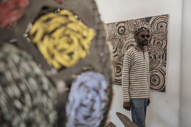 Lehlohonolo Mkhasibe stands by one of his sculptures at FUNDA art foundation in Soweto, South Africa. (AFP/ Gianluigi Guercia) Lehlohonolo Mkhasibe stands by one of his sculptures at FUNDA art foundation in Soweto, South Africa. (AFP/ Gianluigi Guercia)