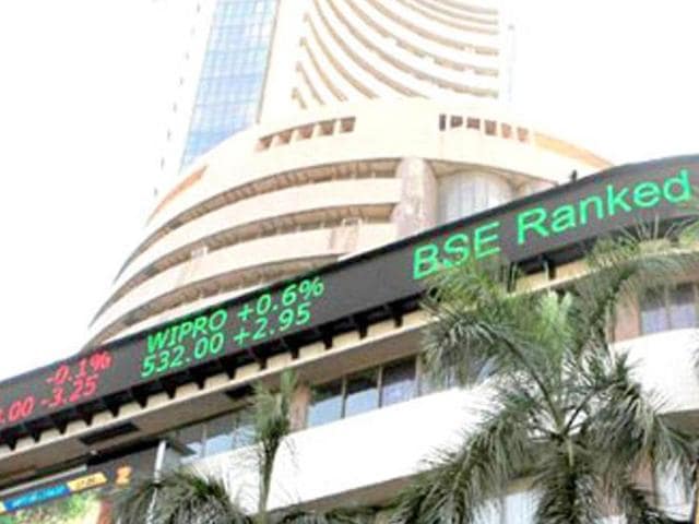 Market benchmark Sensex settled 175.40 points lower at 26,904.11 on Monday after surging over 225 points in early trade following a downward revision in Infosys dollar revenue forecast. (File Photo) Market benchmark Sensex settled 175.40 points lower at 26,904.11 on Monday after surging over 225 points in early trade following a downward revision in Infosys dollar revenue forecast. (File Photo)