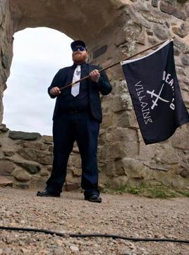 A club member with the flag that was mistaken with that of the Islamic State. (Photo courtesy: Bearded Villains Facebook page) A club member with the flag that was mistaken with that of the Islamic State. (Photo courtesy: Bearded Villains Facebook page)
