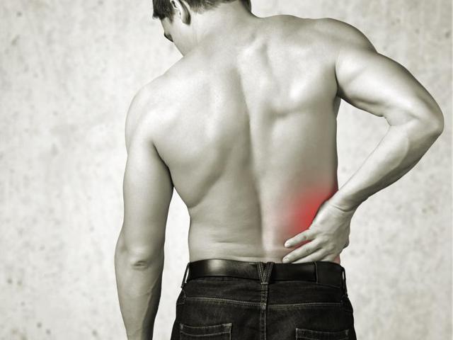 Backaches will trouble you till the time you don’t correct certain lifestyle habits and posture-related activities .(Shutterstock) Backaches will trouble you till the time you don’t correct certain lifestyle habits and posture-related activities .(Shutterstock)