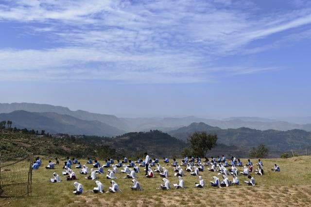 Most of the students enrolled in the school come from villages sandwiched between the Line of Control (LoC) and the Army fence behind it, a dangerous strip over which rockets and bombs fly when the two armies trade fire. (Gurinder Osan/HT Photo) Most of the students enrolled in the school come from villages sandwiched between the Line of Control (LoC) and the Army fence behind it, a dangerous strip over which rockets and bombs fly when the two armies trade fire. (Gurinder Osan/HT Photo)
