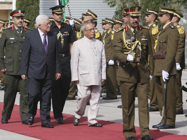 President Pranab Mukherjee reviews the guard of honour upon his arrival at the West Bank city of Ramallah on Monday. (AP) President Pranab Mukherjee reviews the guard of honour upon his arrival at the West Bank city of Ramallah on Monday. (AP)