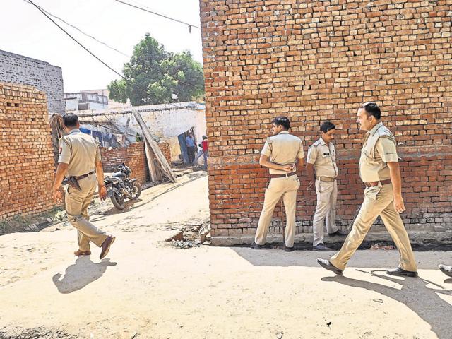 A police team patrols outside the house of Mohmmad Ikhlaq who was killed by a mob over allegations of cow slaughter. (HT File Photo) A police team patrols outside the house of Mohmmad Ikhlaq who was killed by a mob over allegations of cow slaughter. (HT File Photo)