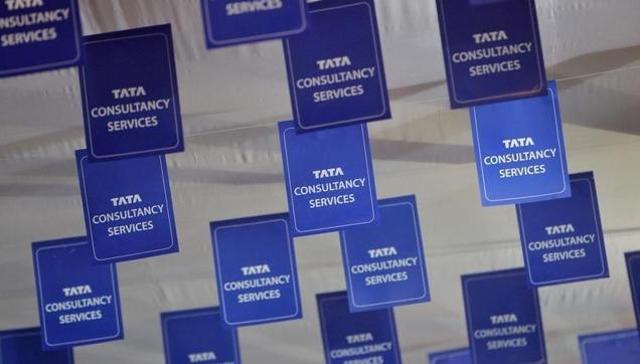 Logos of Tata Consultancy Services (TCS) are displayed at the venue of the annual general meeting of the software services provider in MumbaI. (HT Archive) Logos of Tata Consultancy Services (TCS) are displayed at the venue of the annual general meeting of the software services provider in MumbaI. (HT Archive)