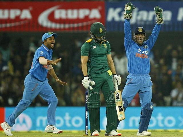 Indian players successfully appeal for the wicket of Farhaan Behardien during the 2nd ODI against South Africa in Indore. (Reuters Photo)