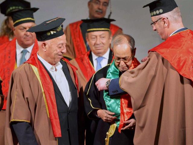 President Pranab Mukherjee during conferment of honorary doctorate by the Prime Minister of Palestine at Al-Quds University, Abu Dees, in Palestine. (PTI) President Pranab Mukherjee during conferment of honorary doctorate by the Prime Minister of Palestine at Al-Quds University, Abu Dees, in Palestine. (PTI)