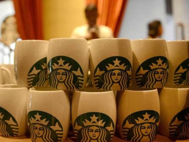Coffee mugs are on display at a Starbucks outlet in Mumbai. (AFP) Coffee mugs are on display at a Starbucks outlet in Mumbai. (AFP)