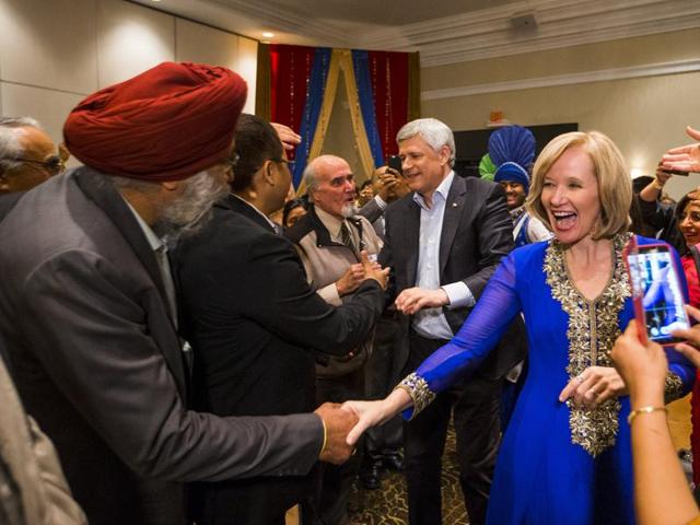 Canada's Prime Minister and Conservative leader Stephen Harper and his wife Laureen arrive at a rally with the South Asian community in Brampton. (REUTERS) Canada's Prime Minister and Conservative leader Stephen Harper and his wife Laureen arrive at a rally with the South Asian community in Brampton. (REUTERS)