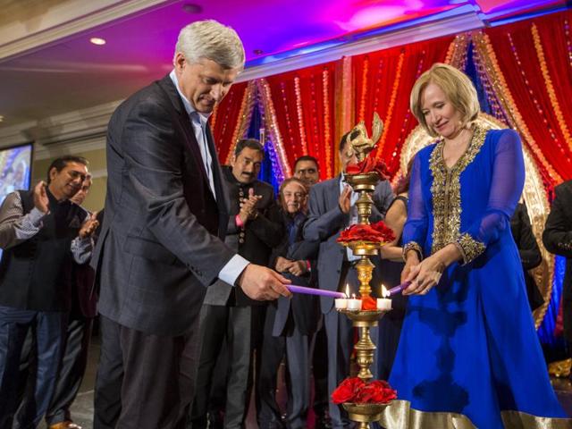 Laureen, the wife of Canada's Conservative Prime Minister Stephen Harper  gets off the campaign bus to join her husband as they visit Vaisaikhi  celebrations on a 2011 Federal Election Campaign stop in