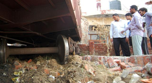 The Railways have marked an inquiry into the derailing and crashing into the residential area. (HT Photo)