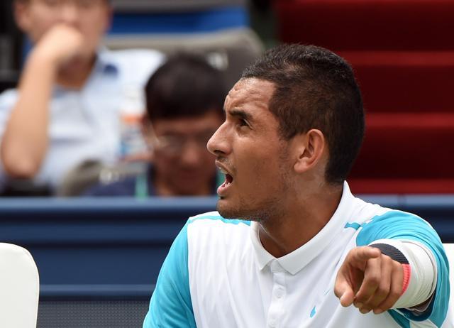 Nick Kyrgios argues with chair umpire Mohamed Lahyani during his match against Kei Nishikori. (AFP Photo) Nick Kyrgios argues with chair umpire Mohamed Lahyani during his match against Kei Nishikori. (AFP Photo)