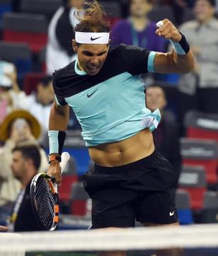 Rafael Nadal pumps his fist and leaps to the air in celebration of his win. (AFP Photo) Rafael Nadal pumps his fist and leaps to the air in celebration of his win. (AFP Photo)