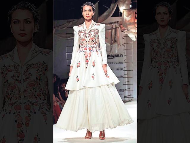 White lehengas are in vogue like never before. Thumbs up to this embroidered long jacket over a voluminous skirt by designer Samant Chauhan.