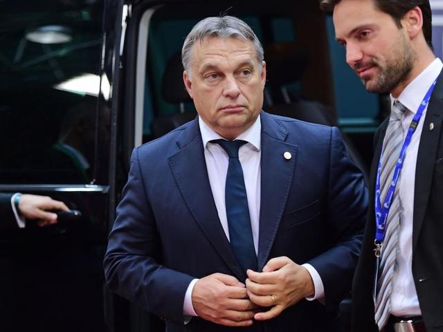 Hungarian Prime Minister Viktor Orban arrives to take part in a European Union (EU) summit dominated by the migration crisis at the European Council in Brussels. (AFP Photo) Hungarian Prime Minister Viktor Orban arrives to take part in a European Union (EU) summit dominated by the migration crisis at the European Council in Brussels. (AFP Photo)
