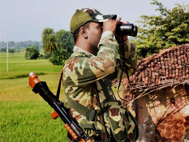CRPF personnel keep vigil during the second phase of Bihar elections at Imamganj. The battle at Imamganj, a reserved SC seat, would be closely watched as former chief minister Jitan Ram Manjhi of Hindustani Awam Morcha (HAM) is contesting Uday Narain Chaudhary of the JD-U. (PTI Photo)