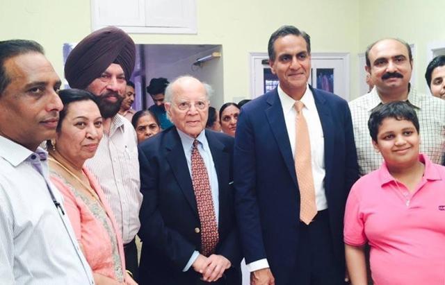 United States Ambassador to India, Richard Verma with his relatives at their native vilage in Apra on the outskirts of Jalandhar. (HT Photo)