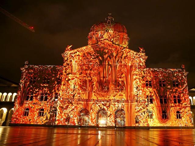 The Swiss Federal Palace Bundeshaus painted in light . (REUTERS)